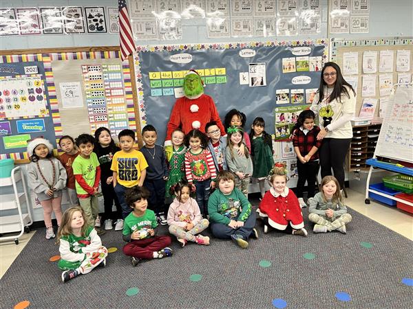 The Grinch visits with classes at Unity Drive!